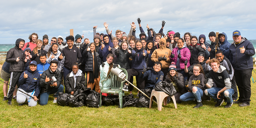 young leaders clean saftey beach